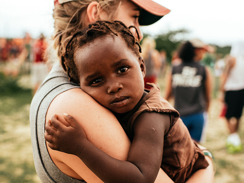 Person Holding a Child 1 Person Holding a Child 1